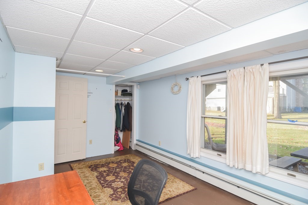 43 Russell Street Methuen, MA 01844 - Photo 34 of 37 a view of a livingroom with wooden floor and a window