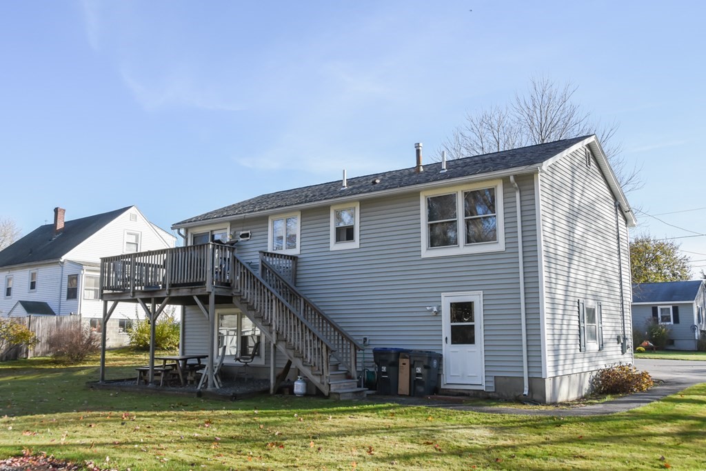 43 Russell Street Methuen, MA 01844 - Photo 4 of 37 a view of a house with a swimming pool
