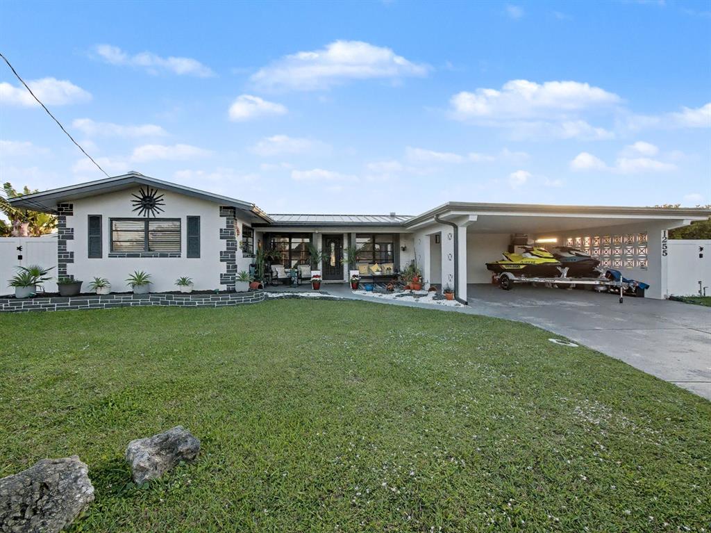 1255 Northwest 63rd Way Margate, FL 33063 - Photo 26 of 33 a view of a house with a backyard