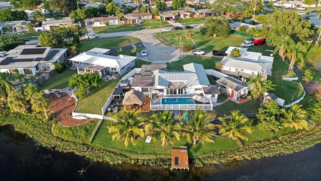 1255 Northwest 63rd Way Margate, FL 33063 - Photo 30 of 33 an aerial view of residential houses with outdoor space and street view