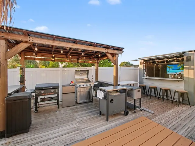 a view of a chairs and table on the wooden floor