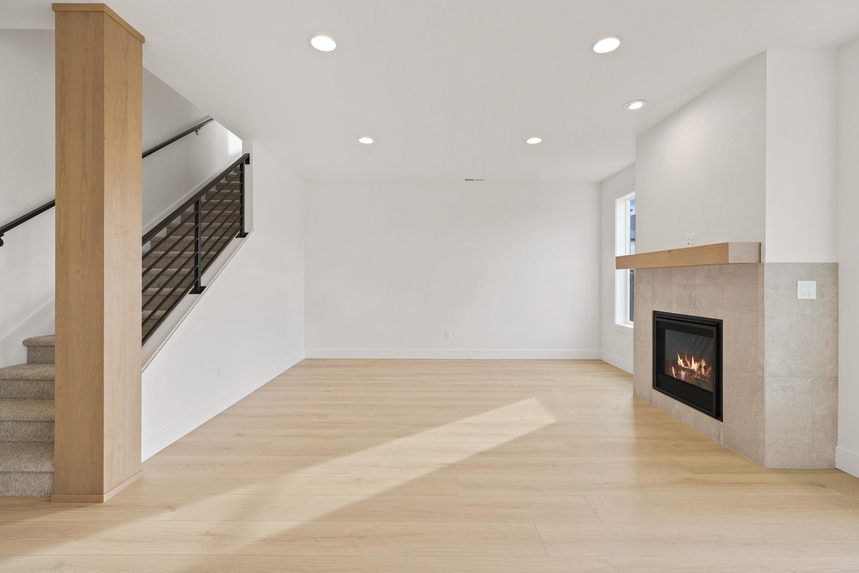 4383 Southwest Rhyolite Place, Unit 22 Redmond, OR 97756 - Photo 11 of 44 a view of an empty room with a fireplace