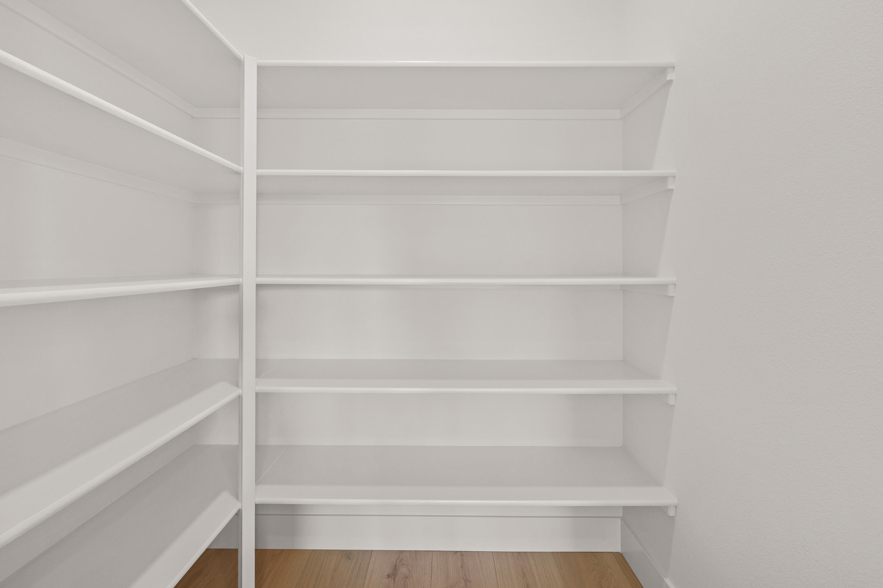 4383 Southwest Rhyolite Place, Unit 22 Redmond, OR 97756 - Photo 18 of 44 a view of walk in closet with empty racks