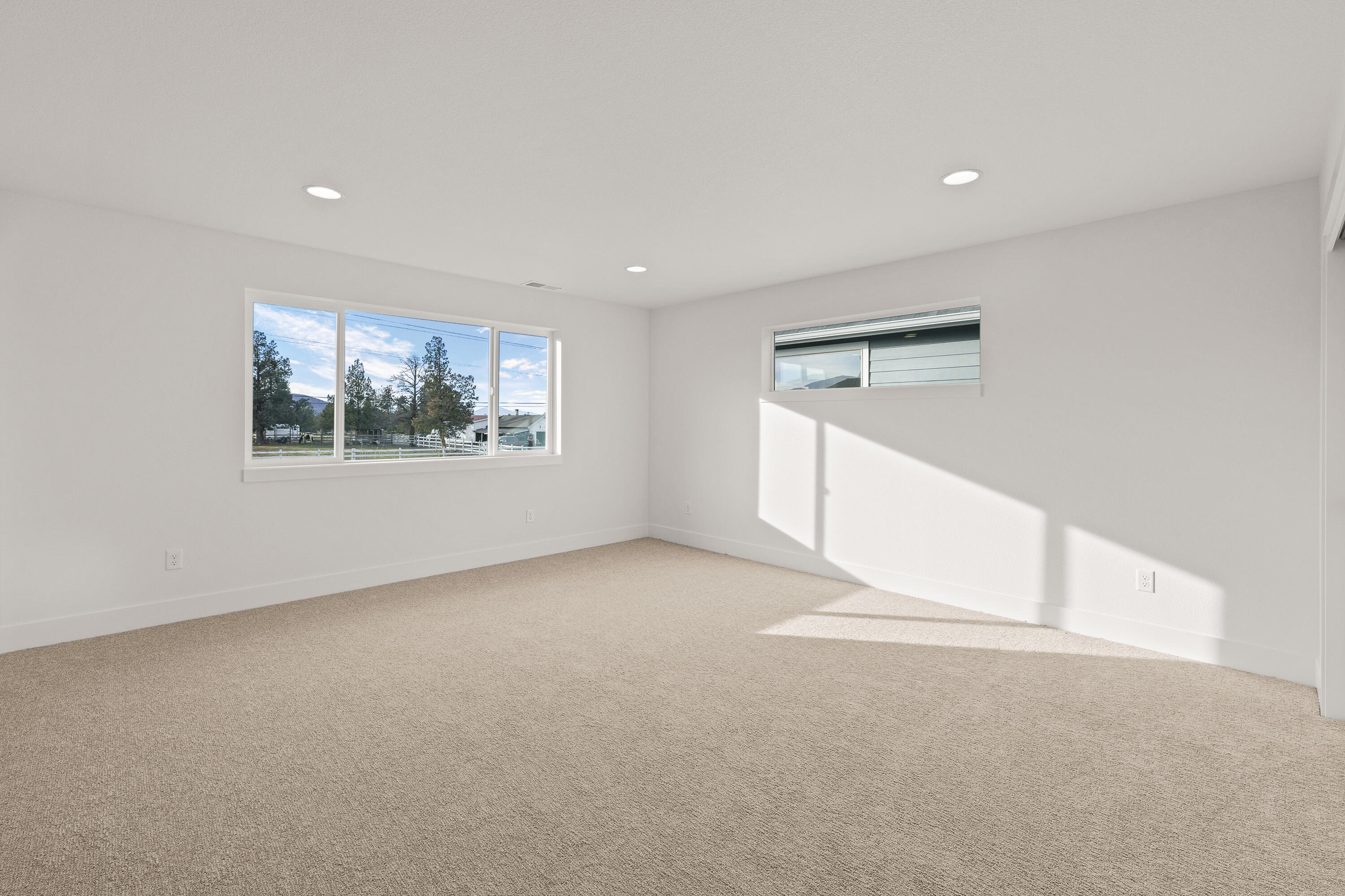 4383 Southwest Rhyolite Place, Unit 22 Redmond, OR 97756 - Photo 22 of 44 a view of empty room with window