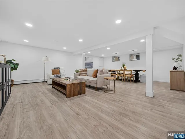 a living room with furniture and a table