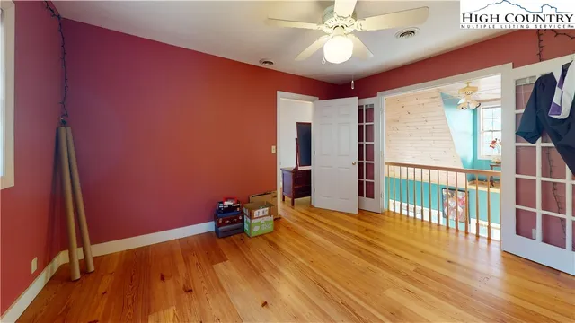 a view of entryway with wooden floor