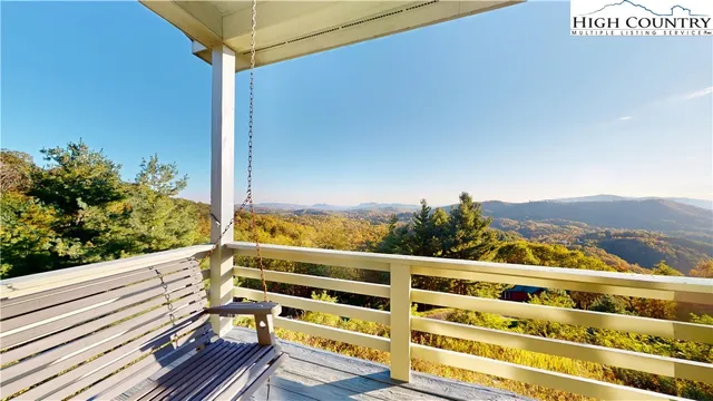 a view of a balcony with an ocean view