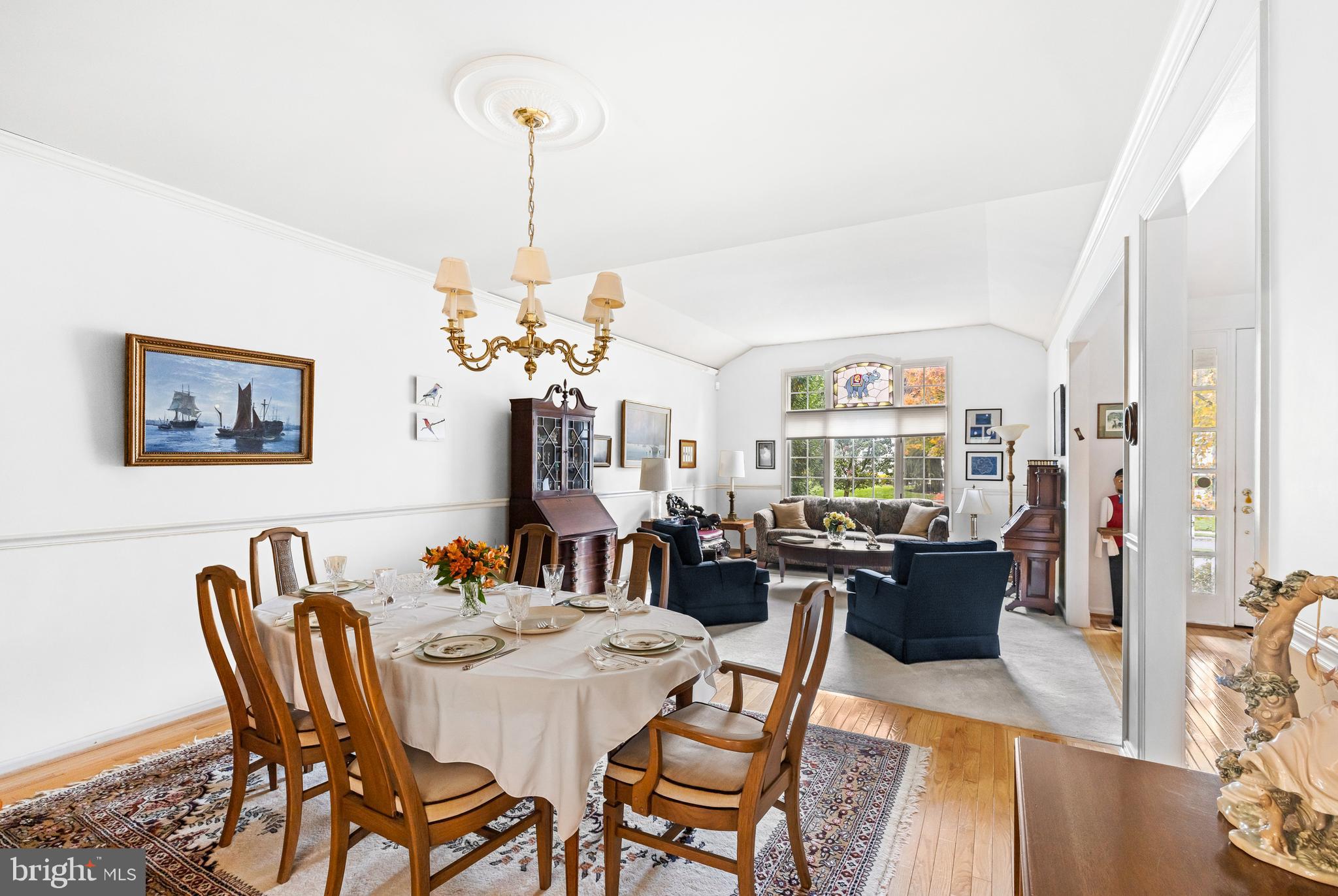 9 Jazz Way Mount Laurel, NJ 08054 - Photo 9 of 36 a view of a dining room with furniture a chandelier and wooden floor