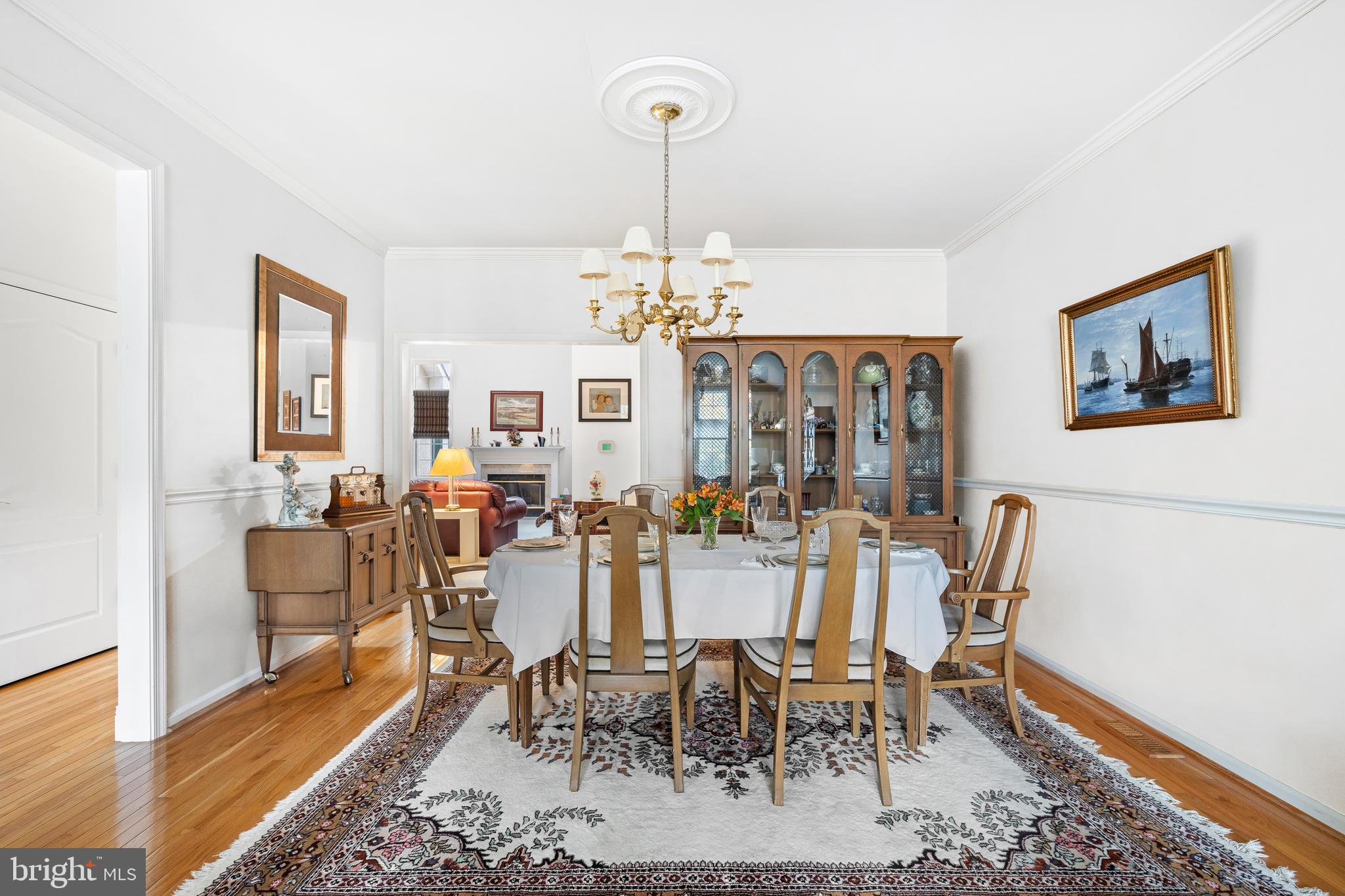 9 Jazz Way Mount Laurel, NJ 08054 - Photo 10 of 36 a view of a dining room with furniture wooden floor and chandelier