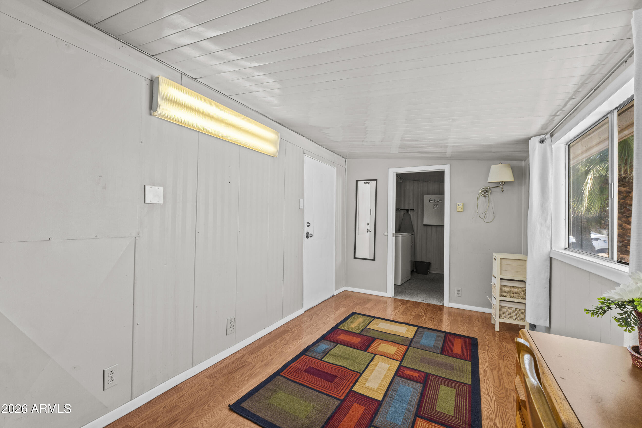 2460 East Main Street, Unit D2 Mesa, AZ 85213 - Photo 15 of 27 a room with a bed and a window