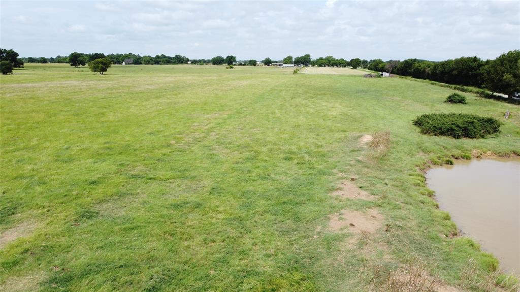 11742 Dane Road Pilot Point, TX 76258 - Photo 15 of 36 a view of an ocean and beach