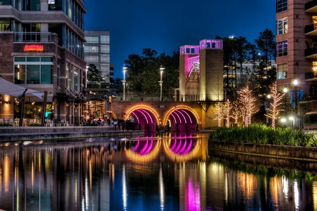 a view of dinning table and chairs in front of building