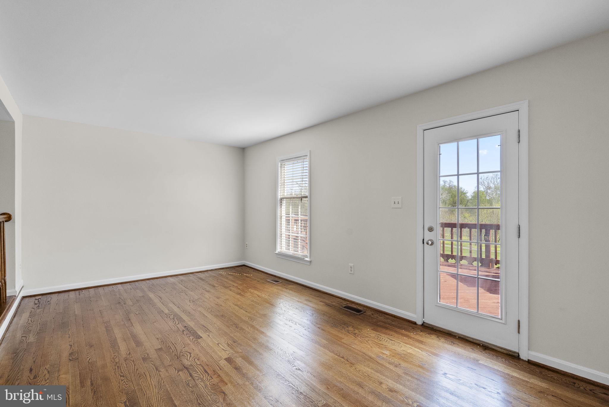 8037 Waterview Court Frederick, MD 21701 - Photo 11 of 33 Living room opens to deck