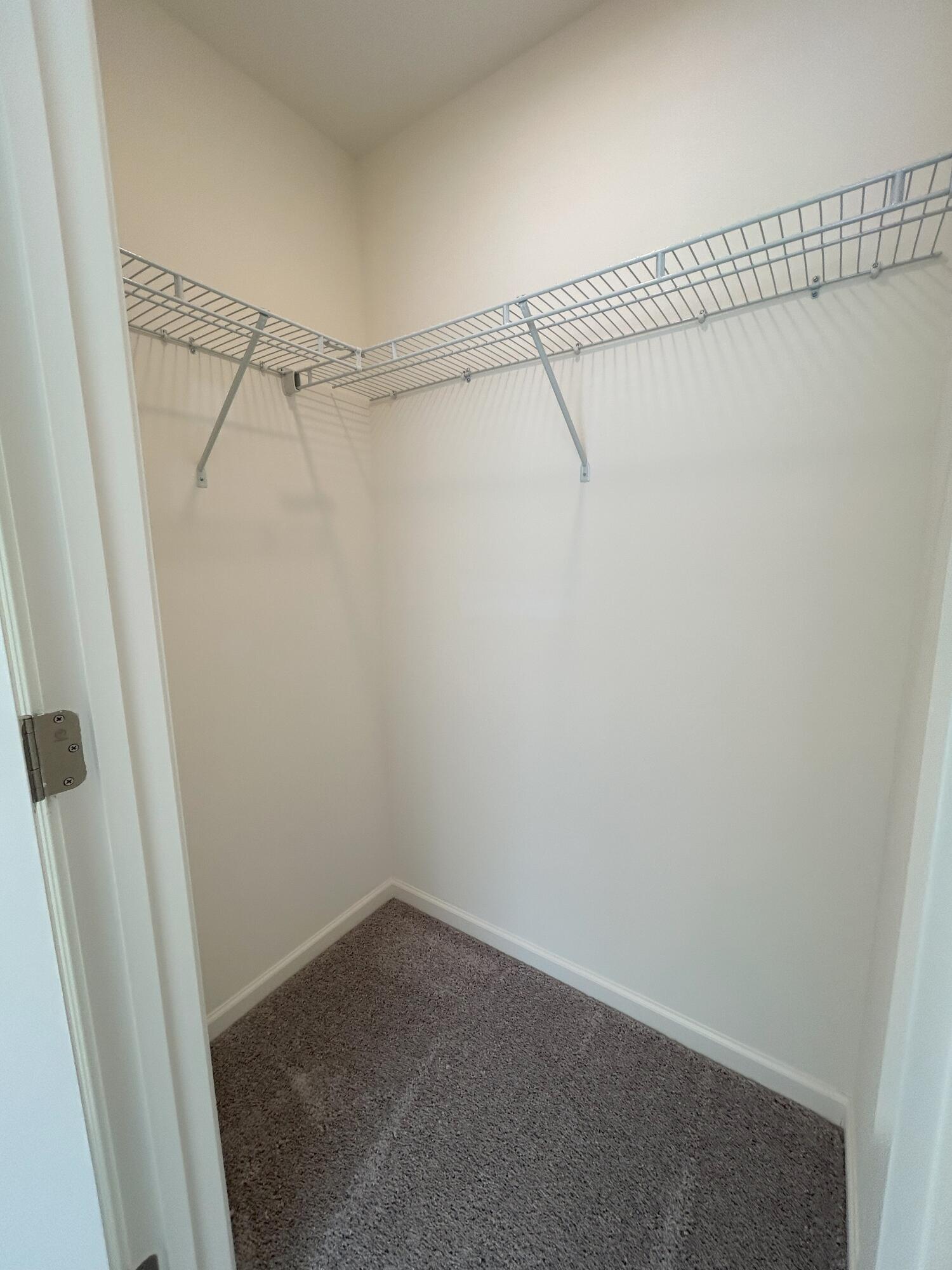2204 Scarlett Maple Street Summerville, SC 29486 - Photo 13 of 14 1303_UPSTAIRSCLOSET_10-26-24