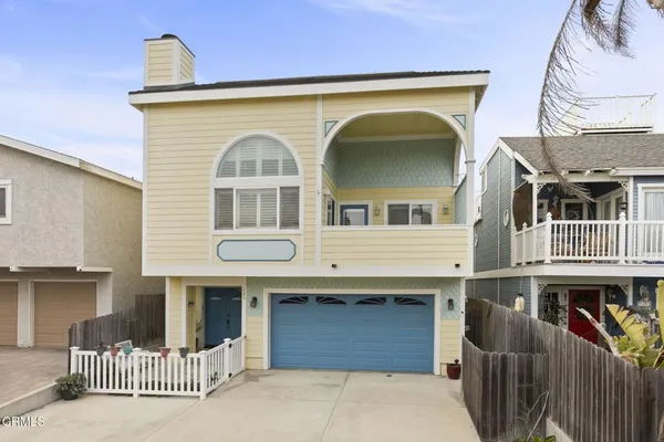 a front view of a house with a porch
