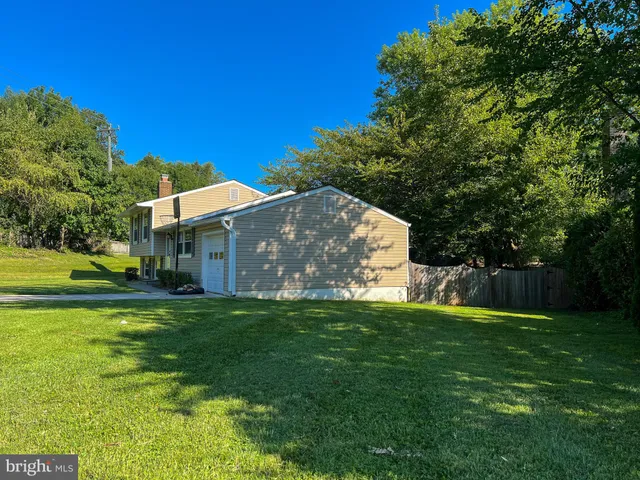 a view of a house with a big yard