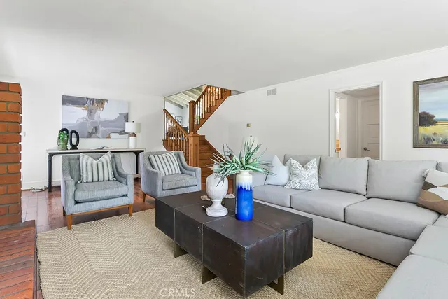 a view of room with window and hardwood