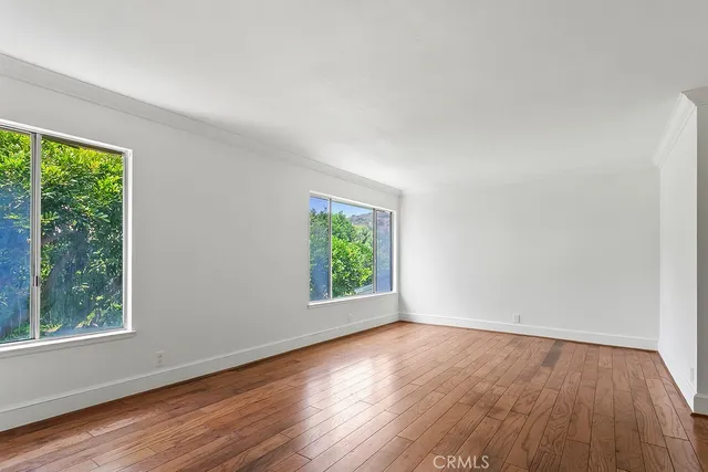 a bathroom with a granite countertop sink mirror and