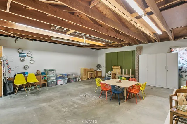 an aerial view of a residential houses and city street