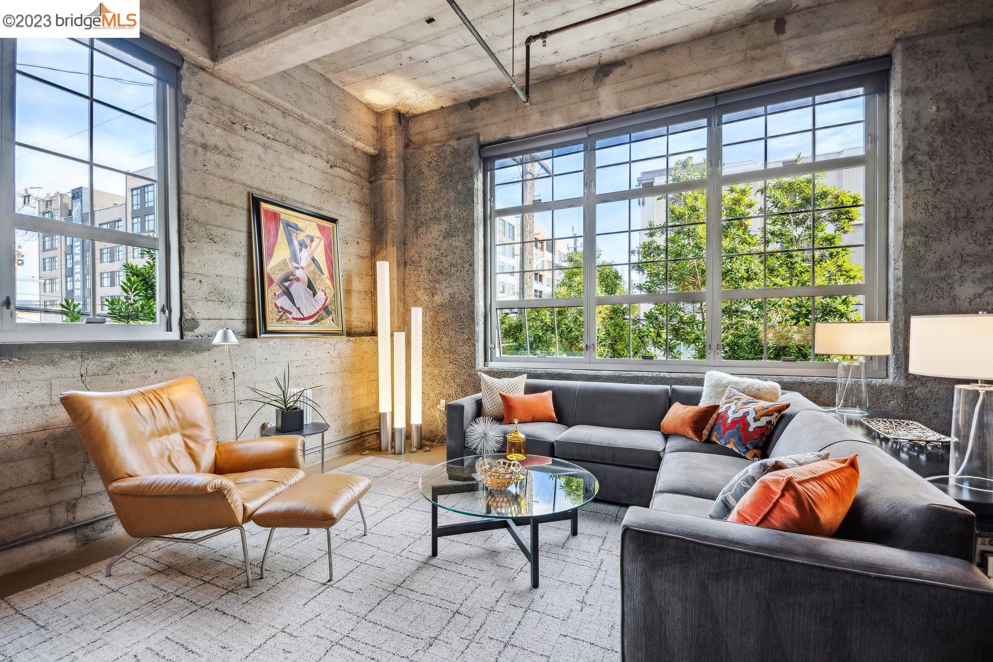 a outdoor living space with furniture and a potted plant