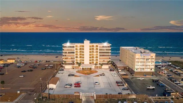 a view of city with ocean