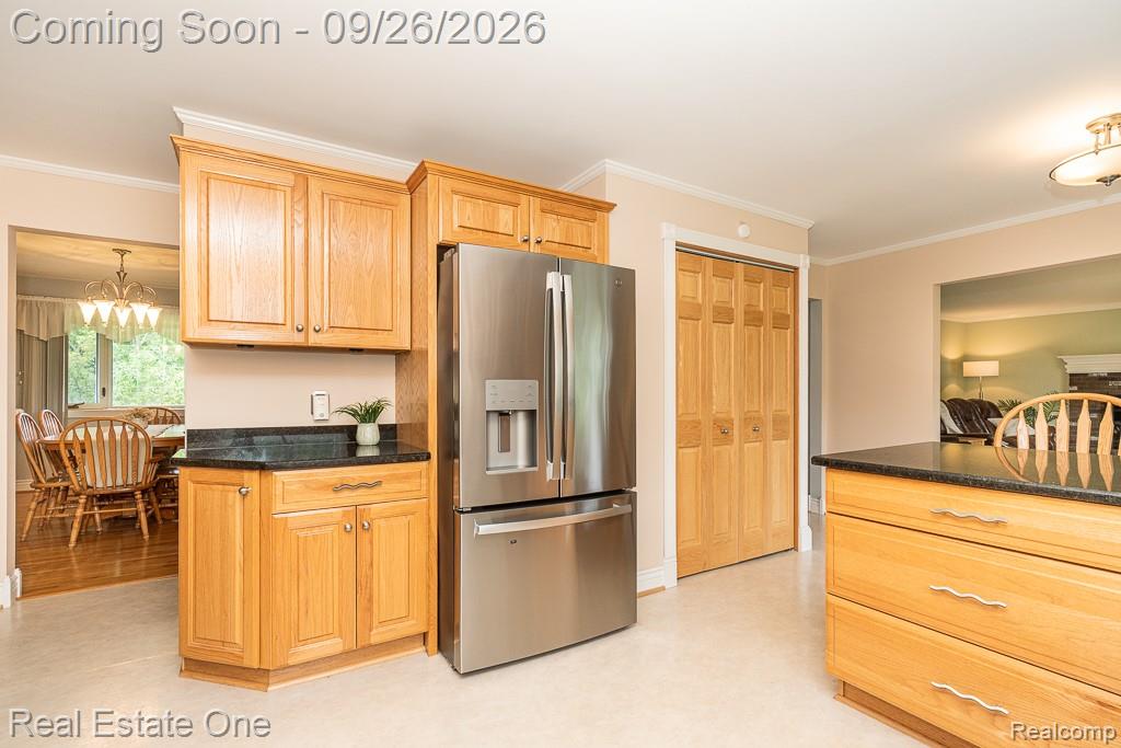 11095 Hogan Road Gaines, MI 48436 - Photo 19 of 47 Newer SS refrigerator included and nice sized pantry.