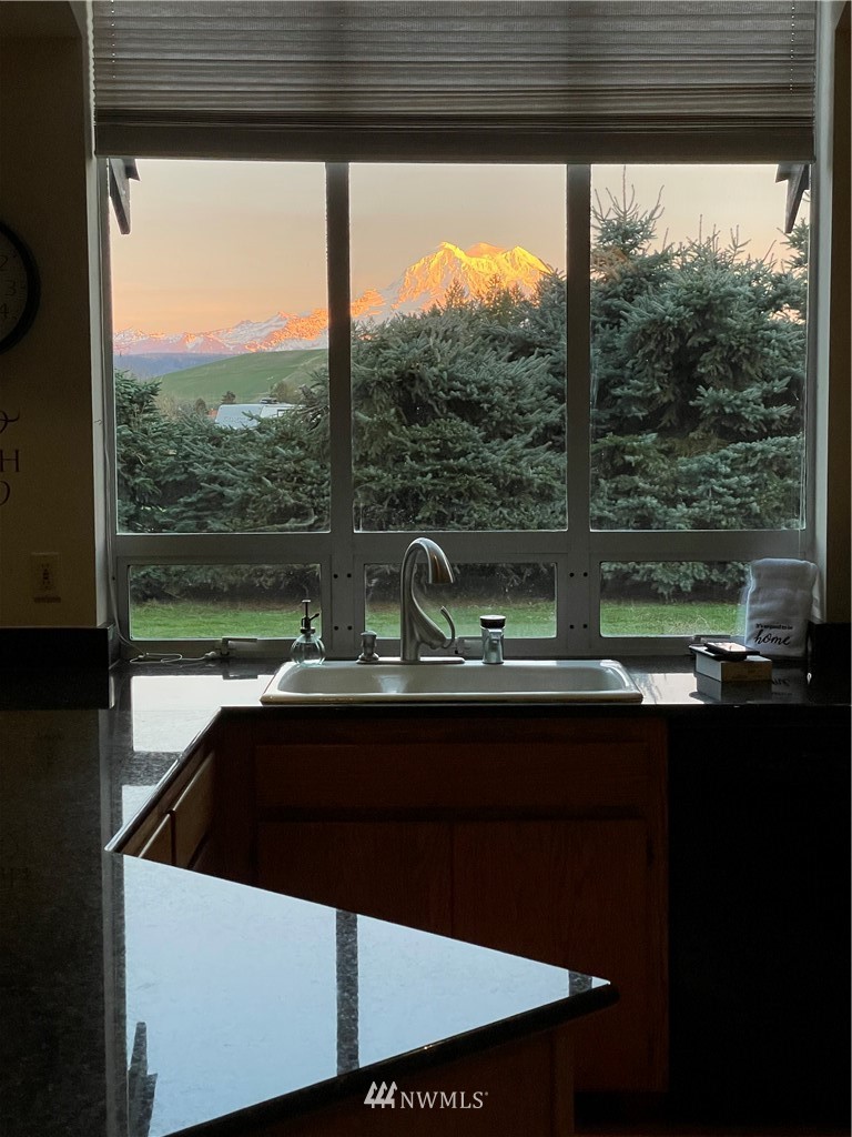 30719 Webster Road East Eatonville, WA 98328 - Photo 3 of 39 a view of a window and sitting area in front of a yard