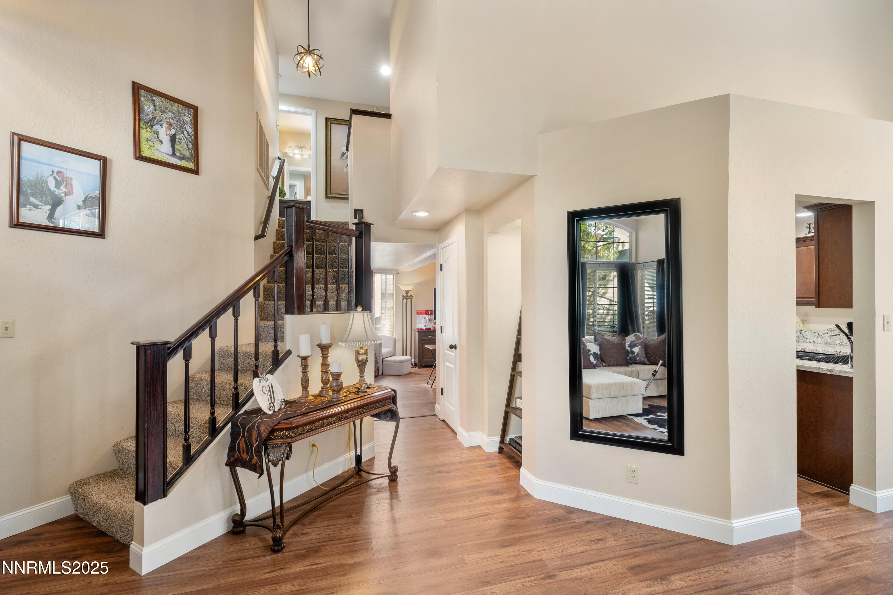 6310 Park Place Reno, NV 89523 - Photo 11 of 43 a view of an entryway with wooden floor and a livingroom
