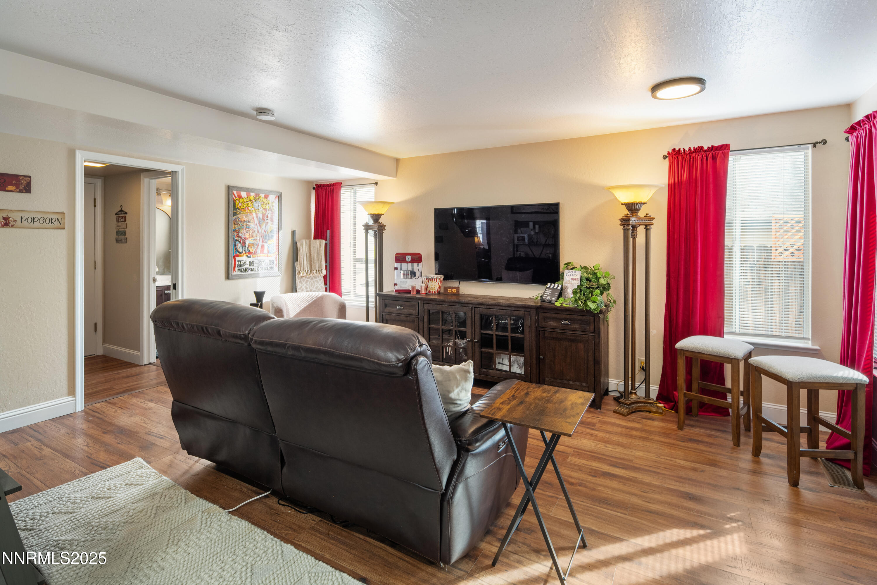 6310 Park Place Reno, NV 89523 - Photo 13 of 43 a living room with furniture and a flat screen tv