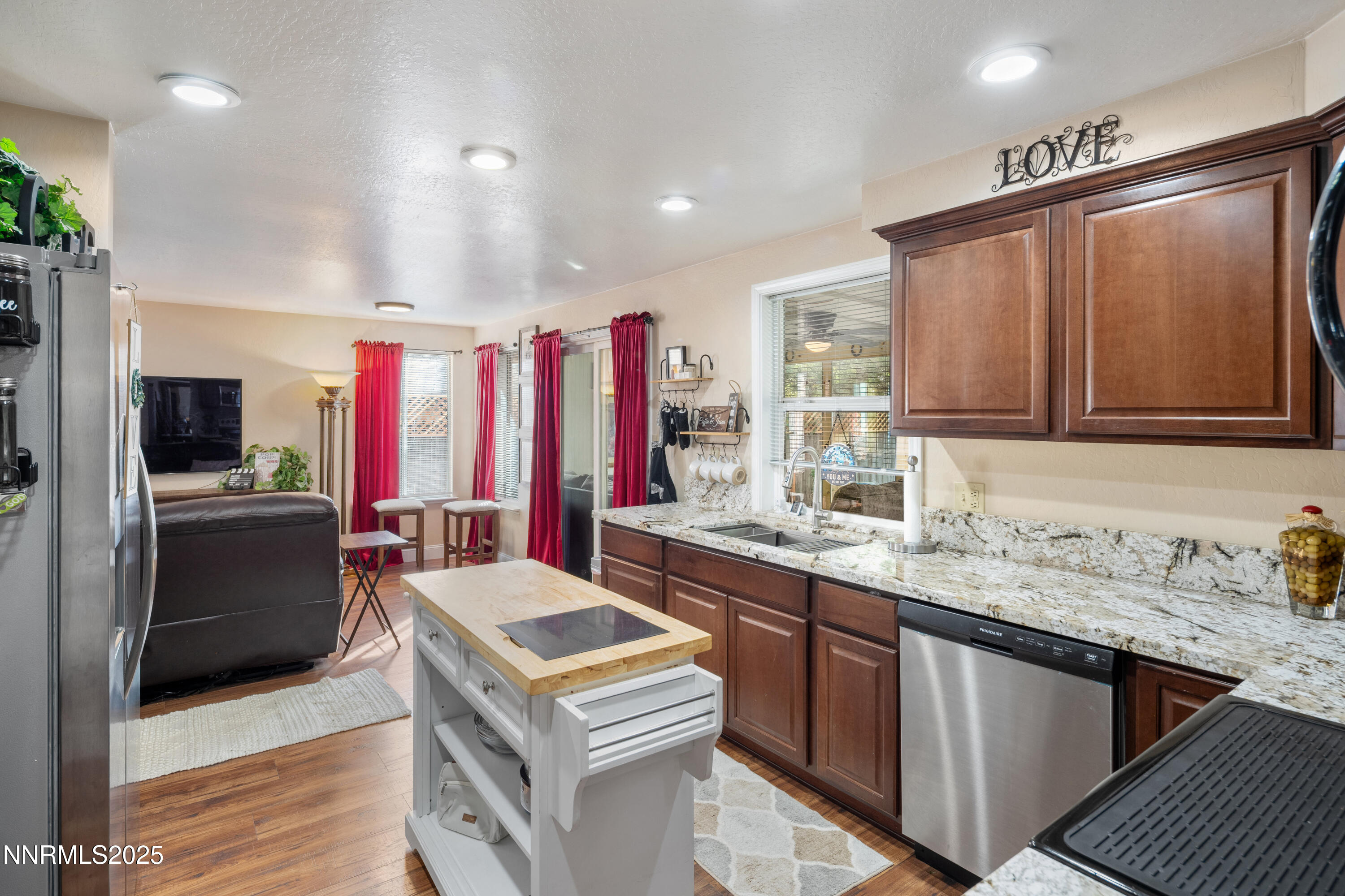 6310 Park Place Reno, NV 89523 - Photo 17 of 43 a kitchen with a sink stove and refrigerator