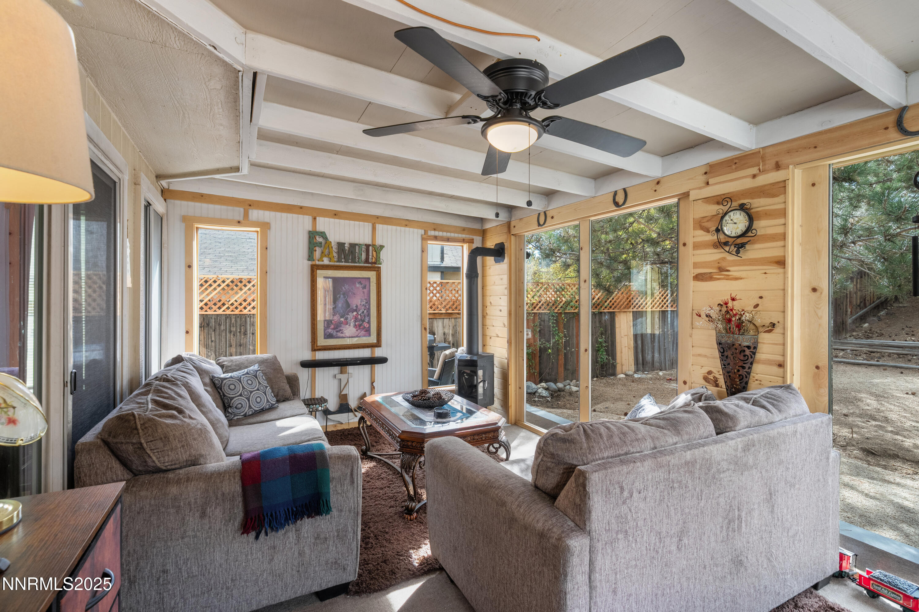 6310 Park Place Reno, NV 89523 - Photo 22 of 43 a living room with furniture and a large window