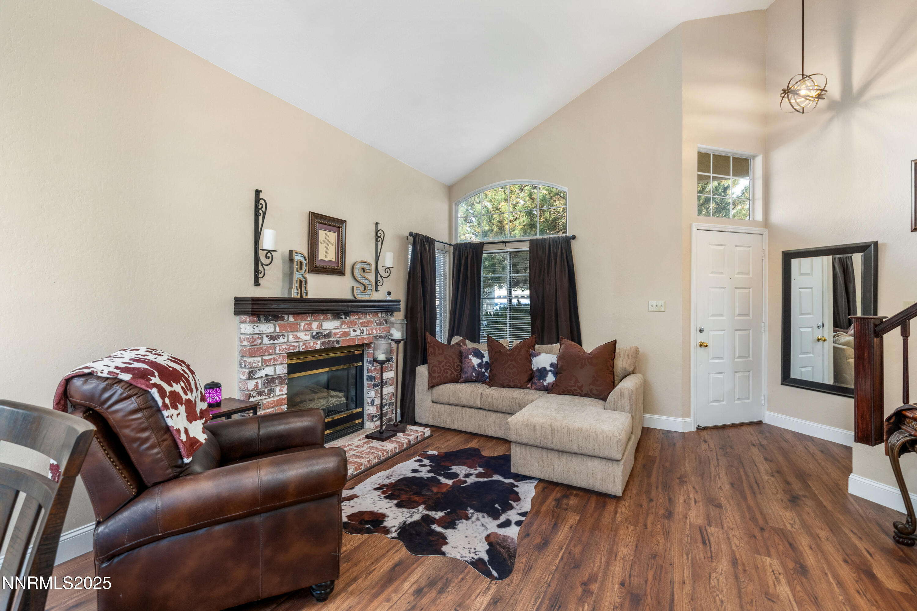 6310 Park Place Reno, NV 89523 - Photo 8 of 43 a living room with furniture and a fireplace