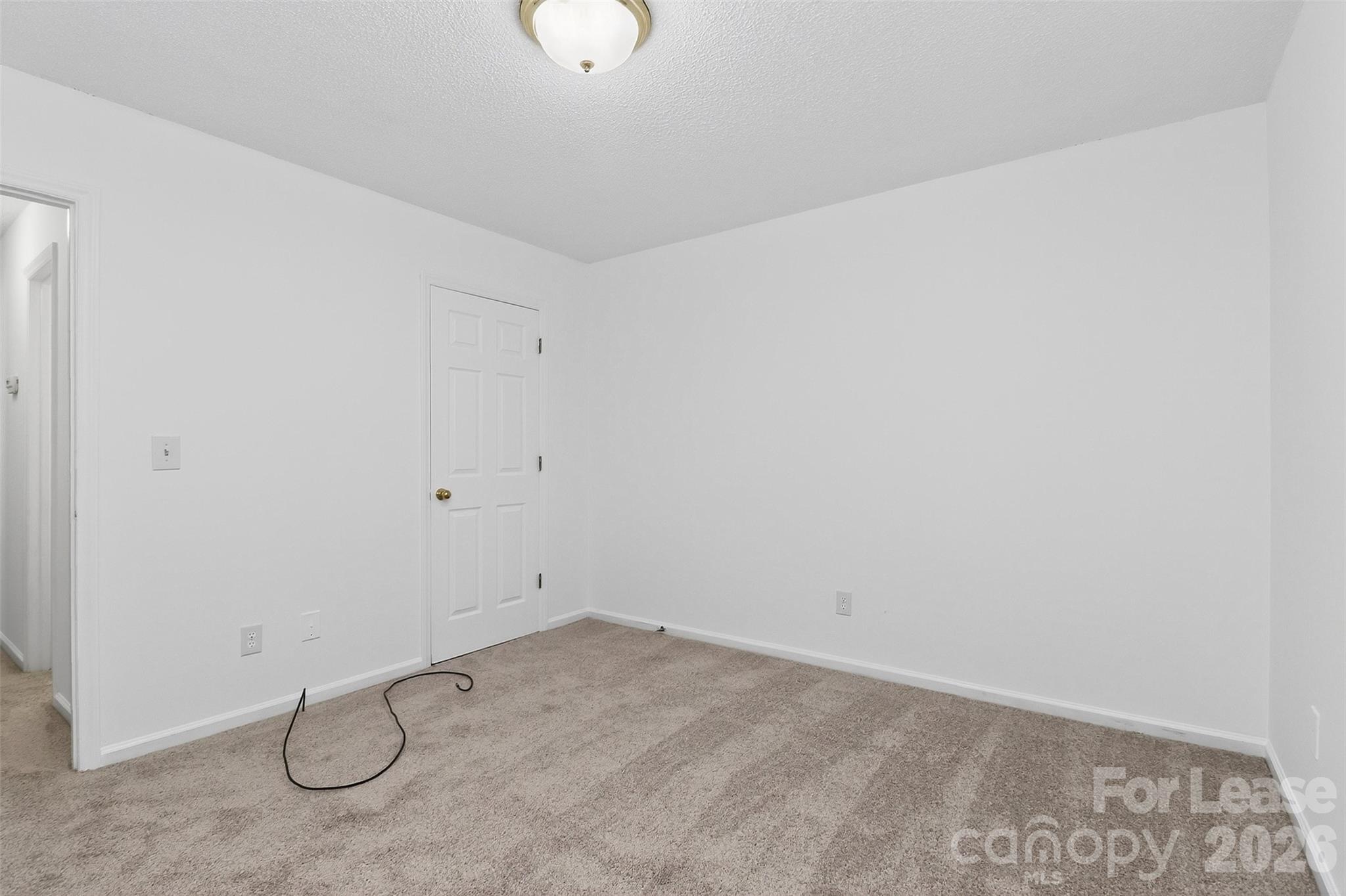 91-93 Sunderland Road Southwest, Unit 93 Concord, NC 28027 - Photo 16 of 30 a view of a room with rack on the wall