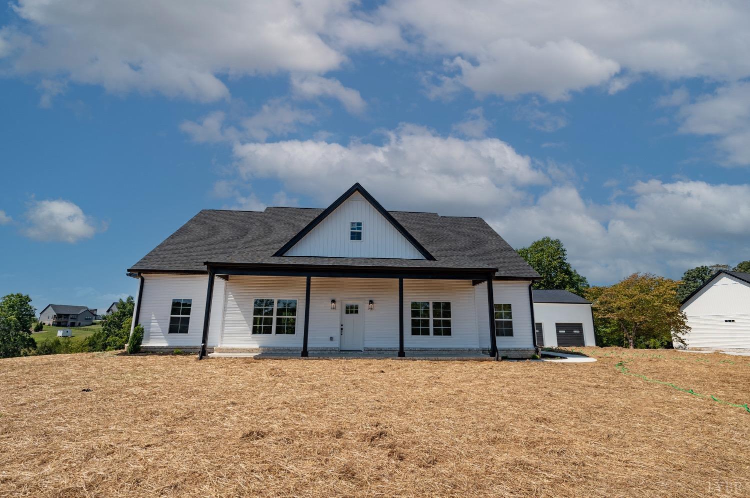 2881 Everett Road Forest, VA 24551 - Photo 1 of 50 front view of a house with a yard