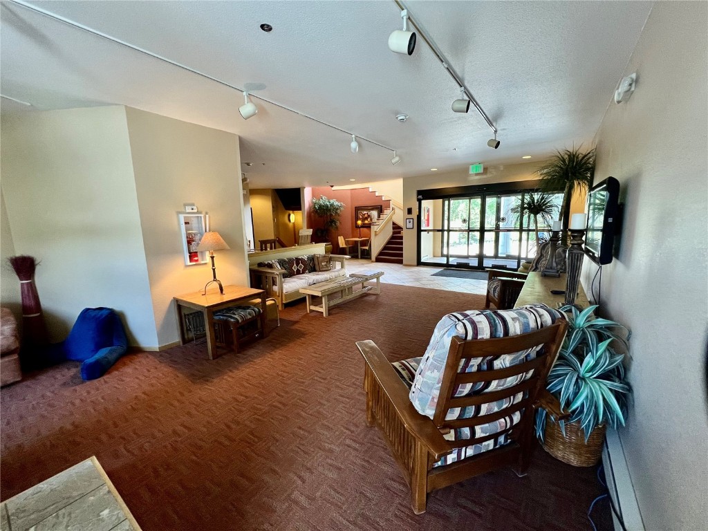 24 River Run Road, Unit 2911 Keystone, CO 80435 - Photo 15 of 24 a living room with furniture fireplace and a flat screen tv