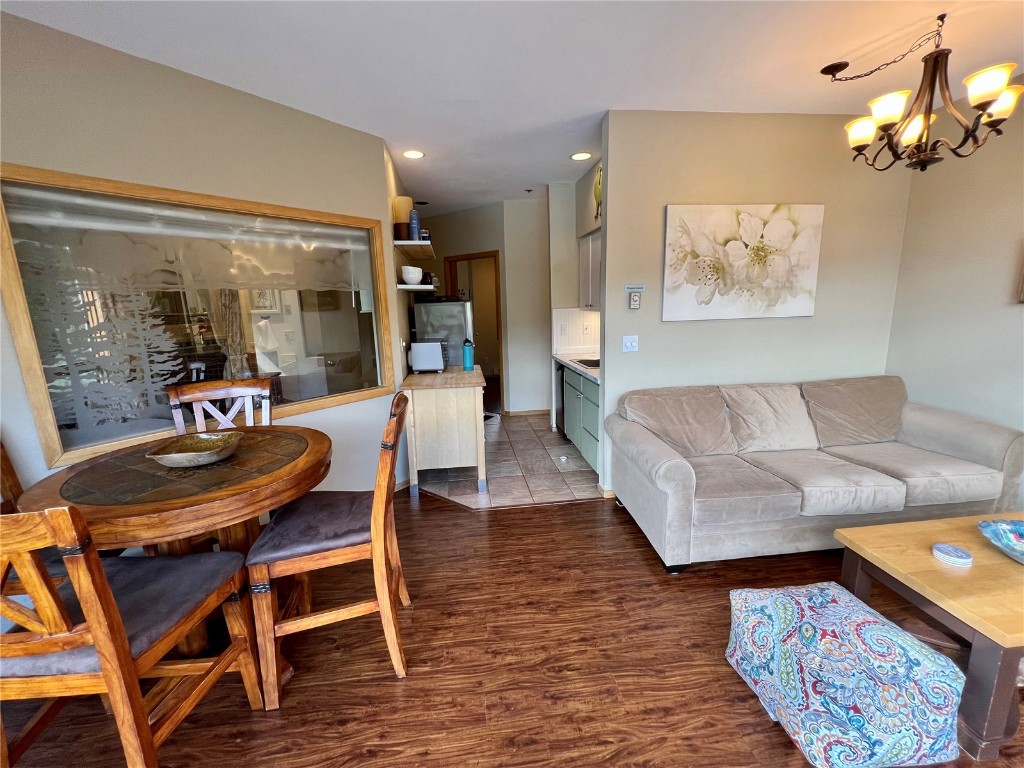 24 River Run Road, Unit 2911 Keystone, CO 80435 - Photo 17 of 24 a living room with furniture and a chandelier