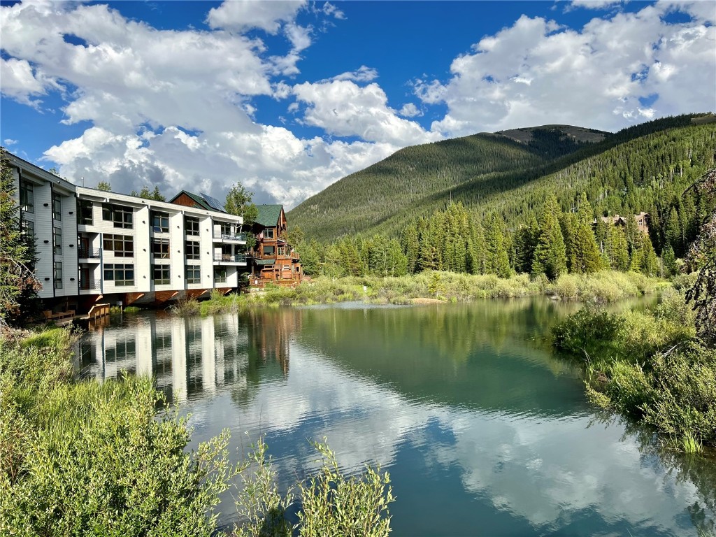 24 River Run Road, Unit 2911 Keystone, CO 80435 - Photo 23 of 24 a view of a lake with a big yard