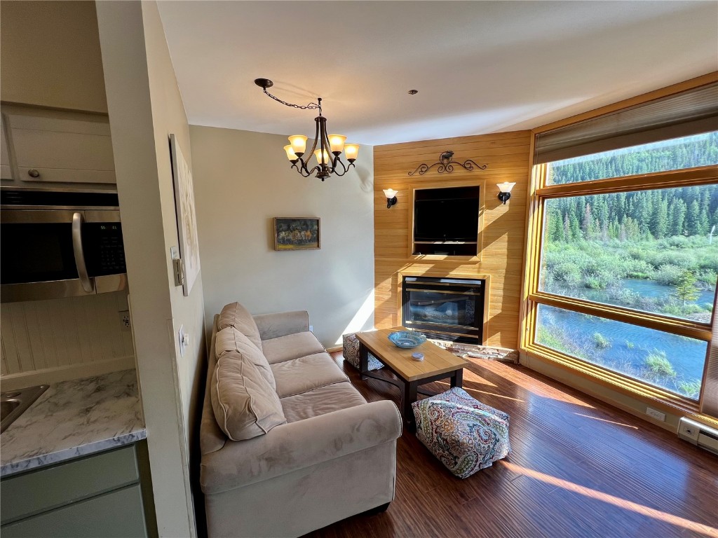 24 River Run Road, Unit 2911 Keystone, CO 80435 - Photo 5 of 24 a living room with furniture and a fireplace