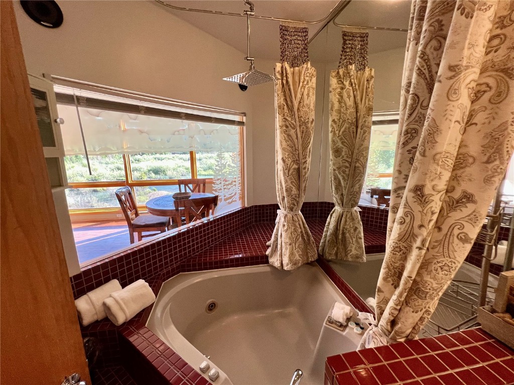 24 River Run Road, Unit 2911 Keystone, CO 80435 - Photo 10 of 24 a bathroom with a bathtub and shower