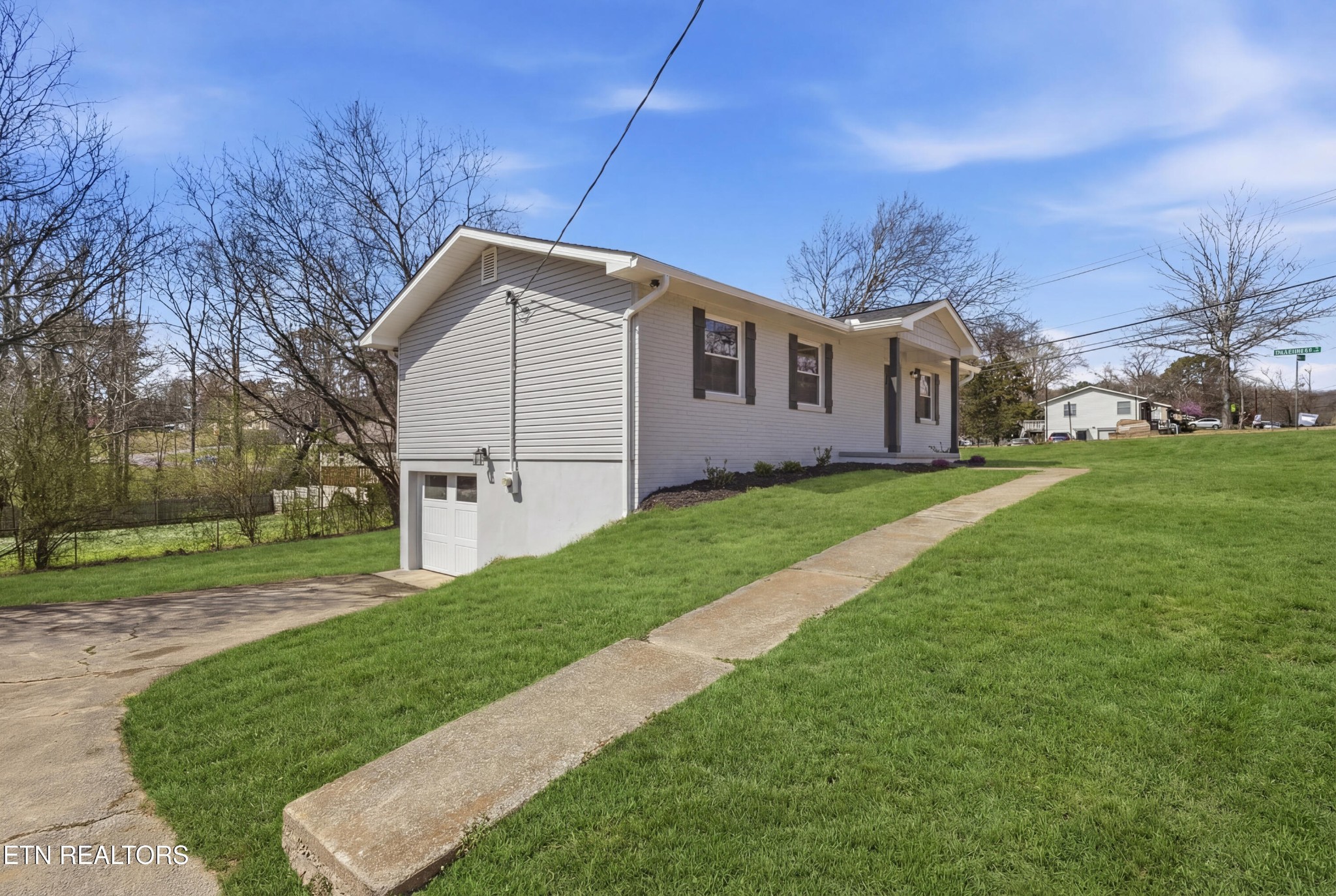 2241 Woods-Smith Road Knoxville, TN 37921 - Photo 2 of 37 a front view of a house with garden