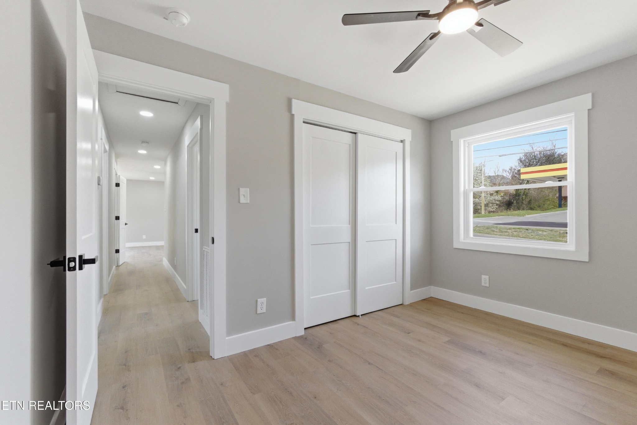 2241 Woods-Smith Road Knoxville, TN 37921 - Photo 23 of 37 wooden floor in an empty room with a window
