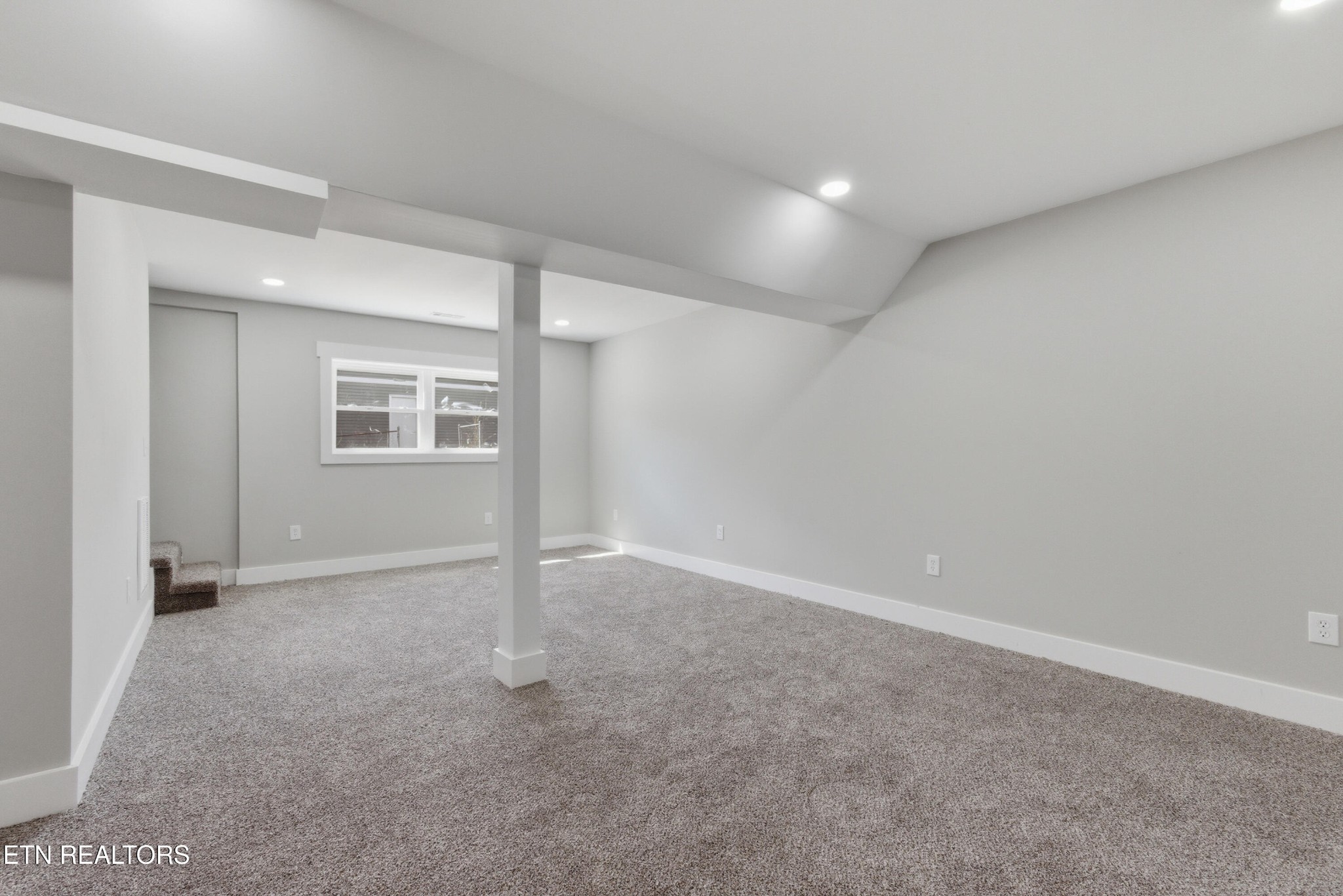 2241 Woods-Smith Road Knoxville, TN 37921 - Photo 27 of 37 an empty room with windows