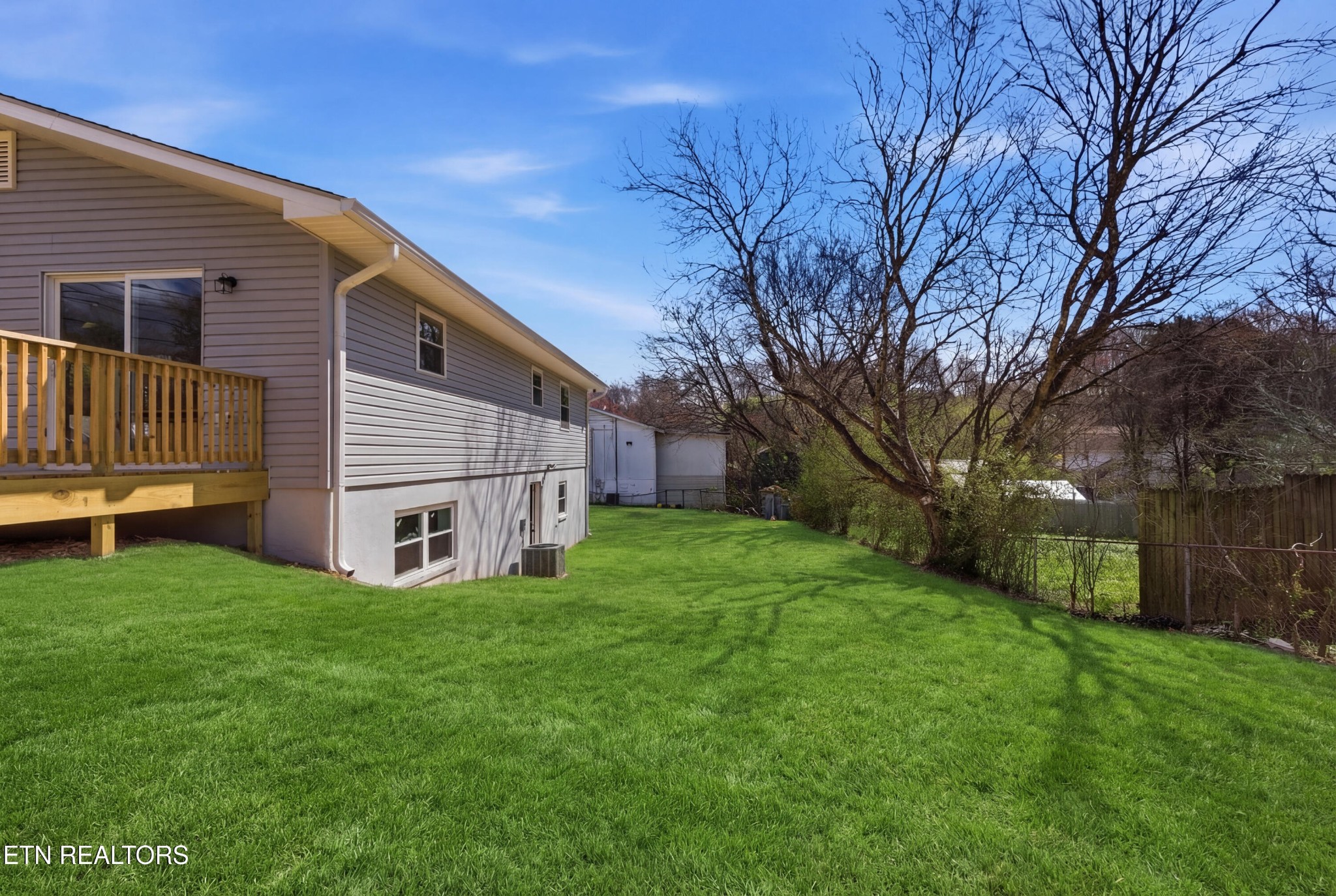 2241 Woods-Smith Road Knoxville, TN 37921 - Photo 35 of 37 a view of a house with a yard