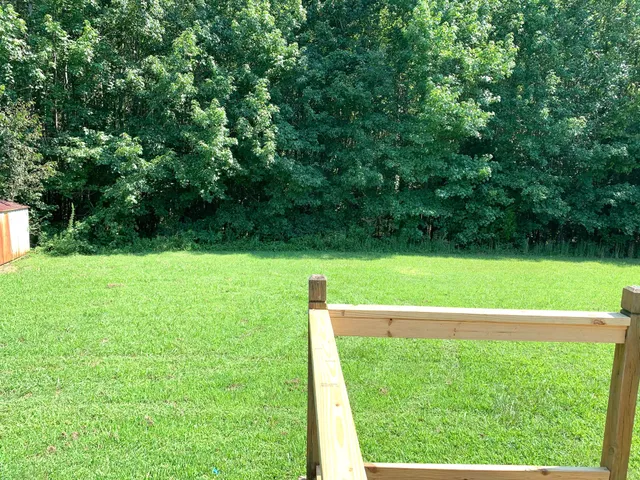 a view of a golf course with a park