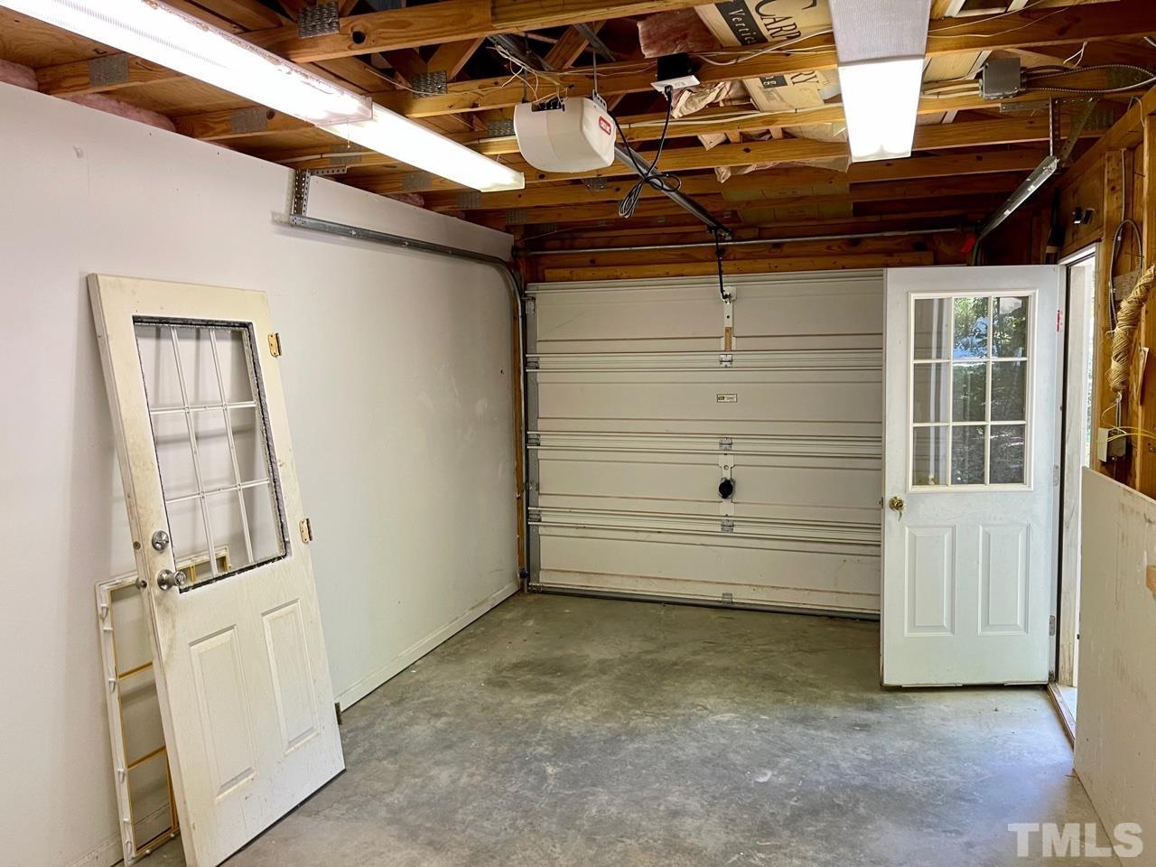 149 Waters Edge Road Henderson, NC 27537 - Photo 25 of 31 a view of a room with wooden walls