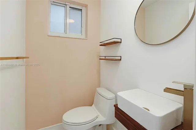 a view of swimming pool with a patio