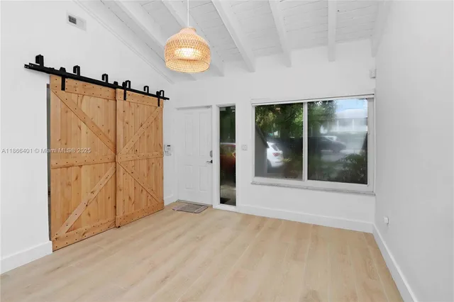 an empty room with windows