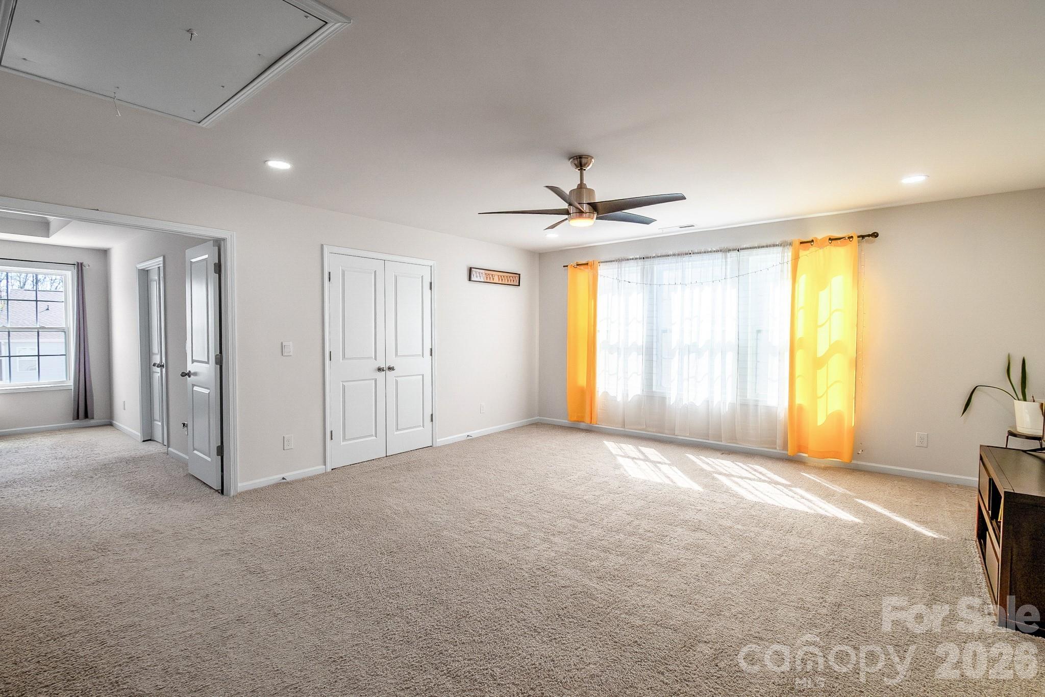 1630 Fitzgerald Street Northwest Concord, NC 28027 - Photo 17 of 38 a view of an empty room with a window