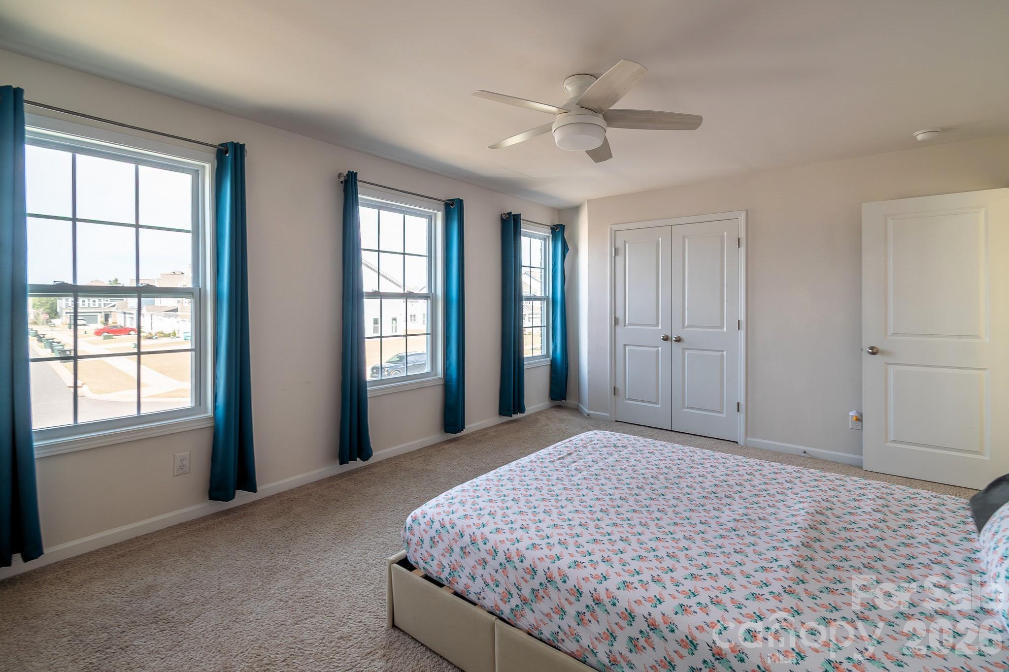 1630 Fitzgerald Street Northwest Concord, NC 28027 - Photo 25 of 38 a bedroom with a bed and a window