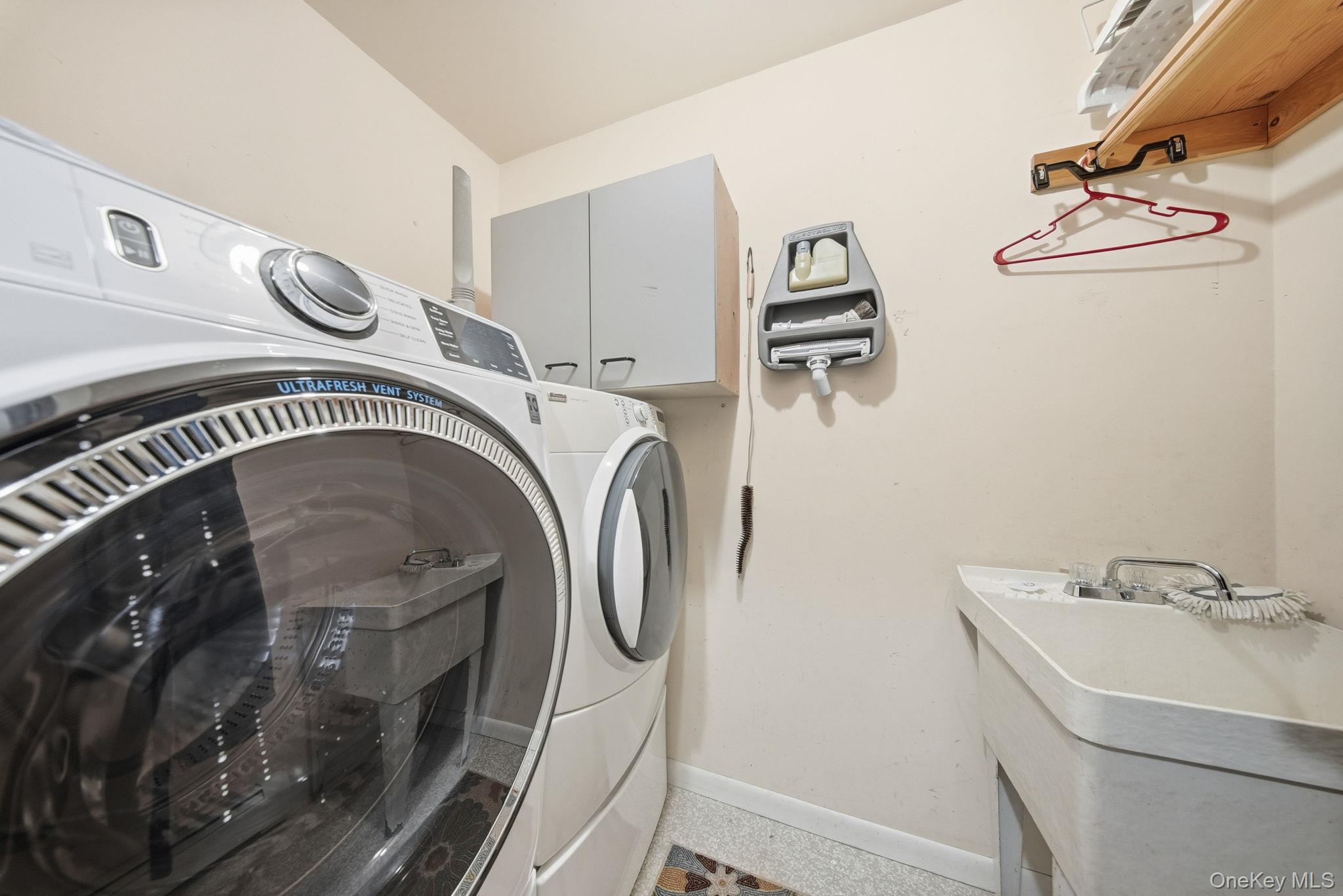 139 Renner Road Mountain Dale, NY 12763 - Photo 19 of 49 a utility room with dryer and washer